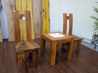 Solid wood Chairs and Teak Table with carved parsley inlay.