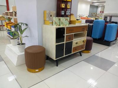 A blend of wood, furry leather and wood veneer in a Scandinavian style sideboard.