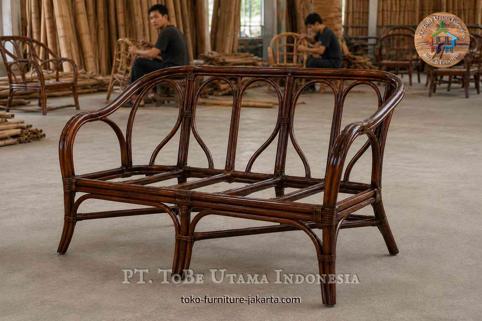 Brown two-seat furniture frame in a workshop production area