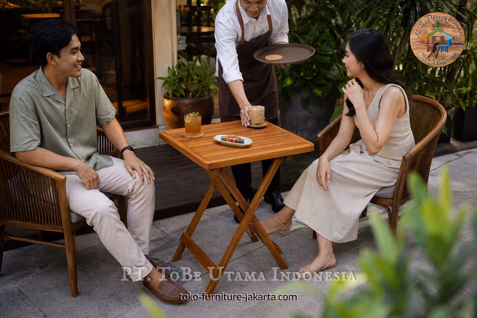 Square folding wood table serving drinks between two patio cafe chairs