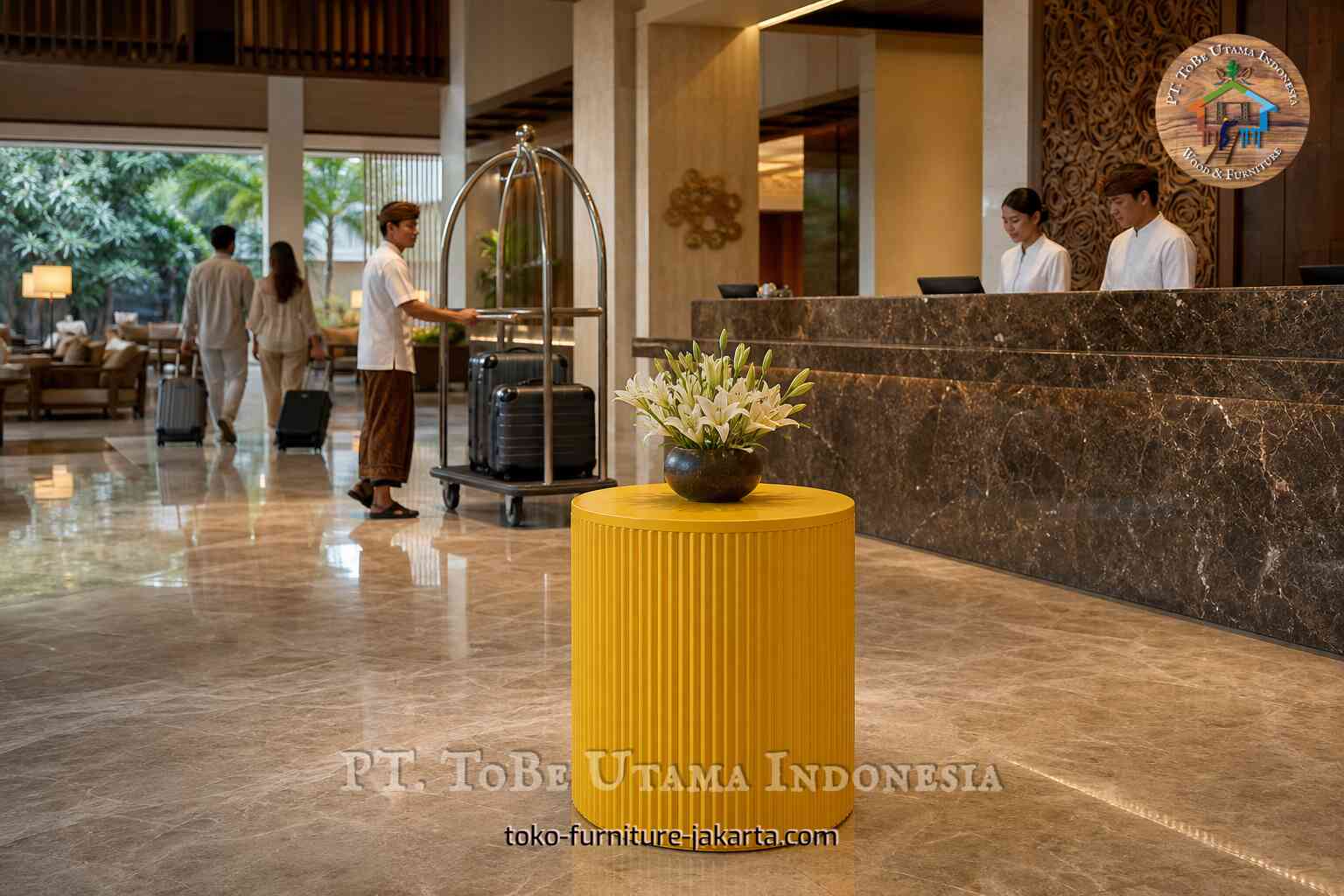 Yellow round table with flowers in a hotel lobby near reception, guests, staff, and luggage