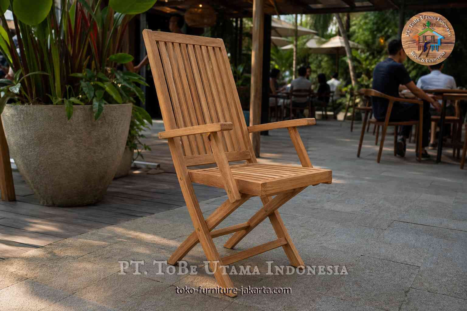 Minimalist wood-toned slatted chair with armrests on an outdoor cafe patio with guests behind